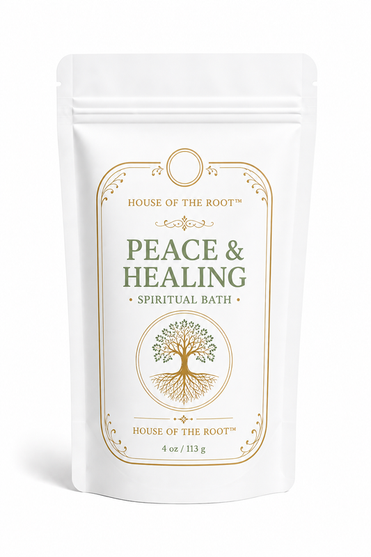 Blockbuster Spiritual Bath by House of the Root™ displayed in a clean, elevated setting with a matte white pouch and gold detailing, styled with bold, energized elements representing the breaking of obstacles, forceful movement and powerful spiritual clearing.