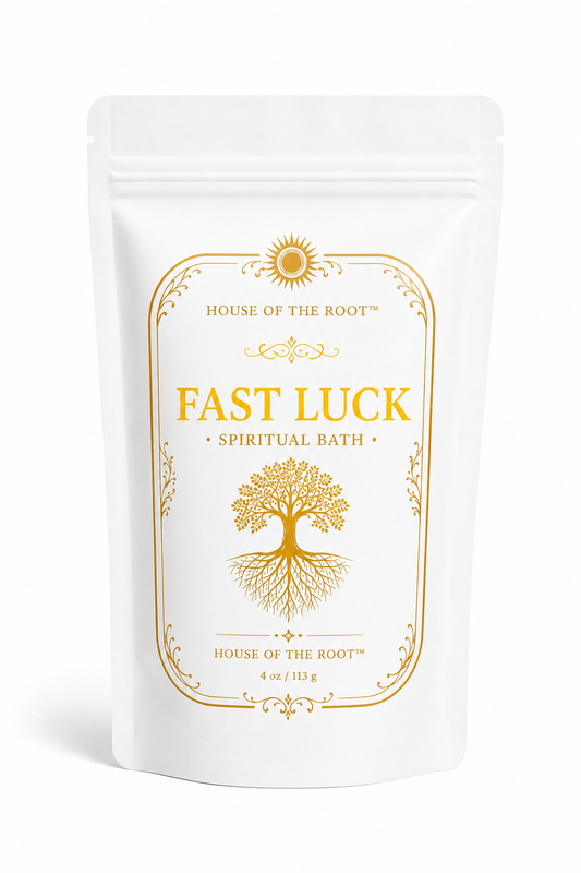 Fast Luck Spiritual Bath by House of the Root™ displayed in a clean, elevated setting with a matte white pouch and gold detailing, styled with bright, energized elements representing quick results, opportunity, momentum and immediate movement.