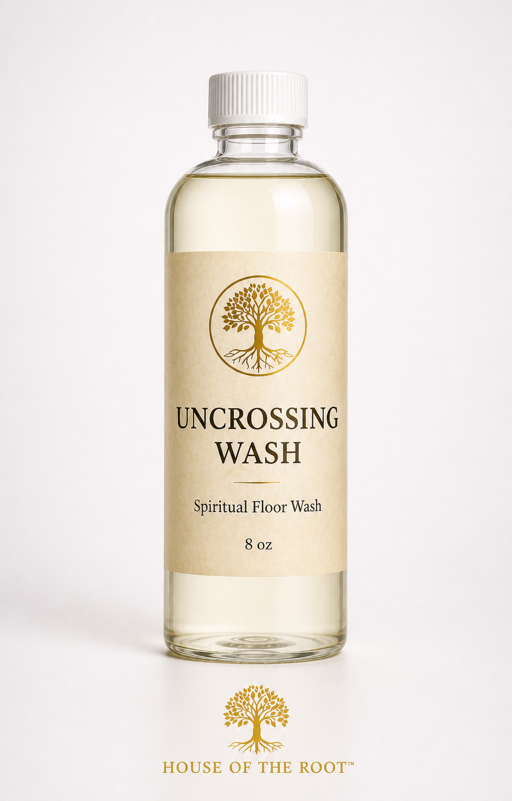 Clear 8 oz Uncrossing Wash bottle with cream label and gold tree logo standing upright against a clean neutral background, House of the Root™ branding below.