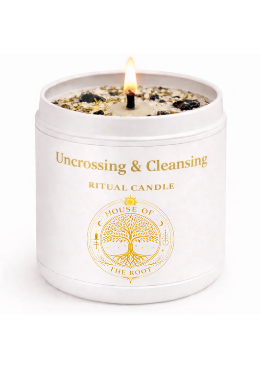 White uncrossing and cleansing ritual candle with gold label and House of the Root logo on clean white background